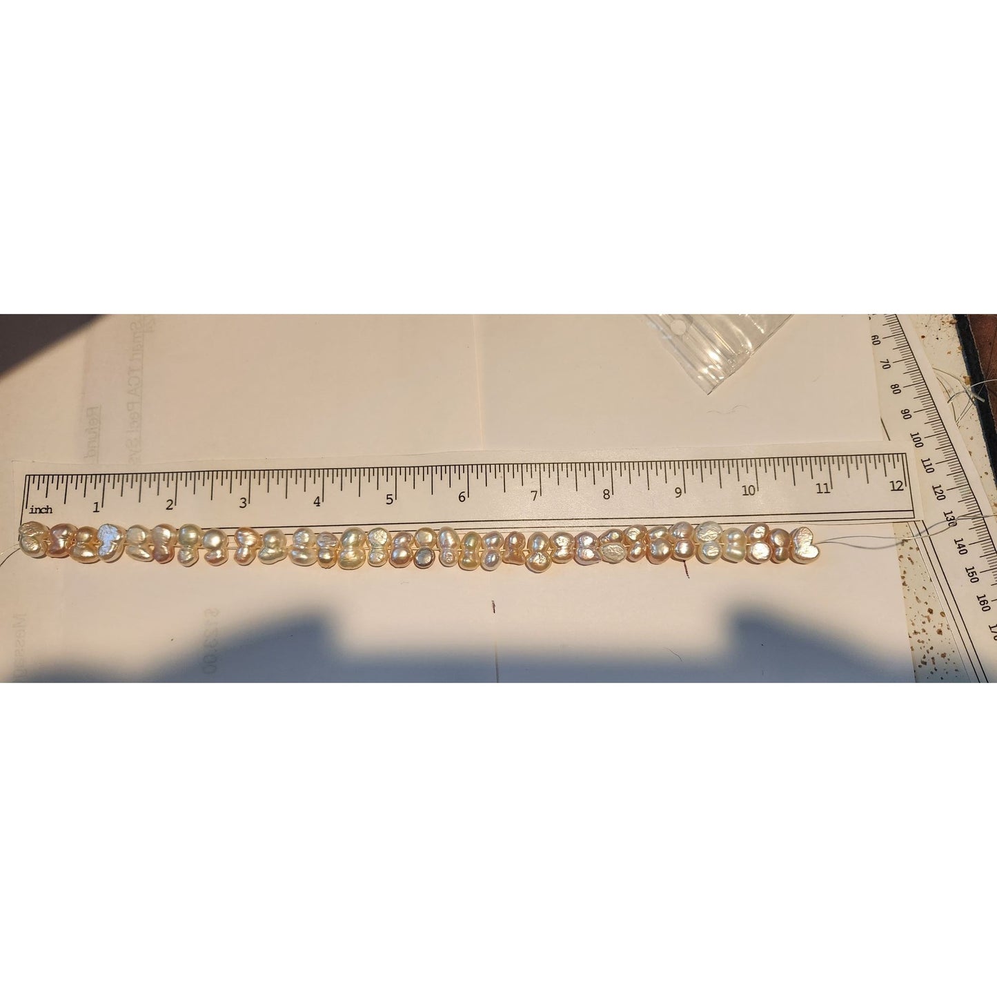 Pearls 32 Freshwater Cultured 10–12mm Baroque Pearl Strand, White 11 " Strand Middle hole Slight Pink tint