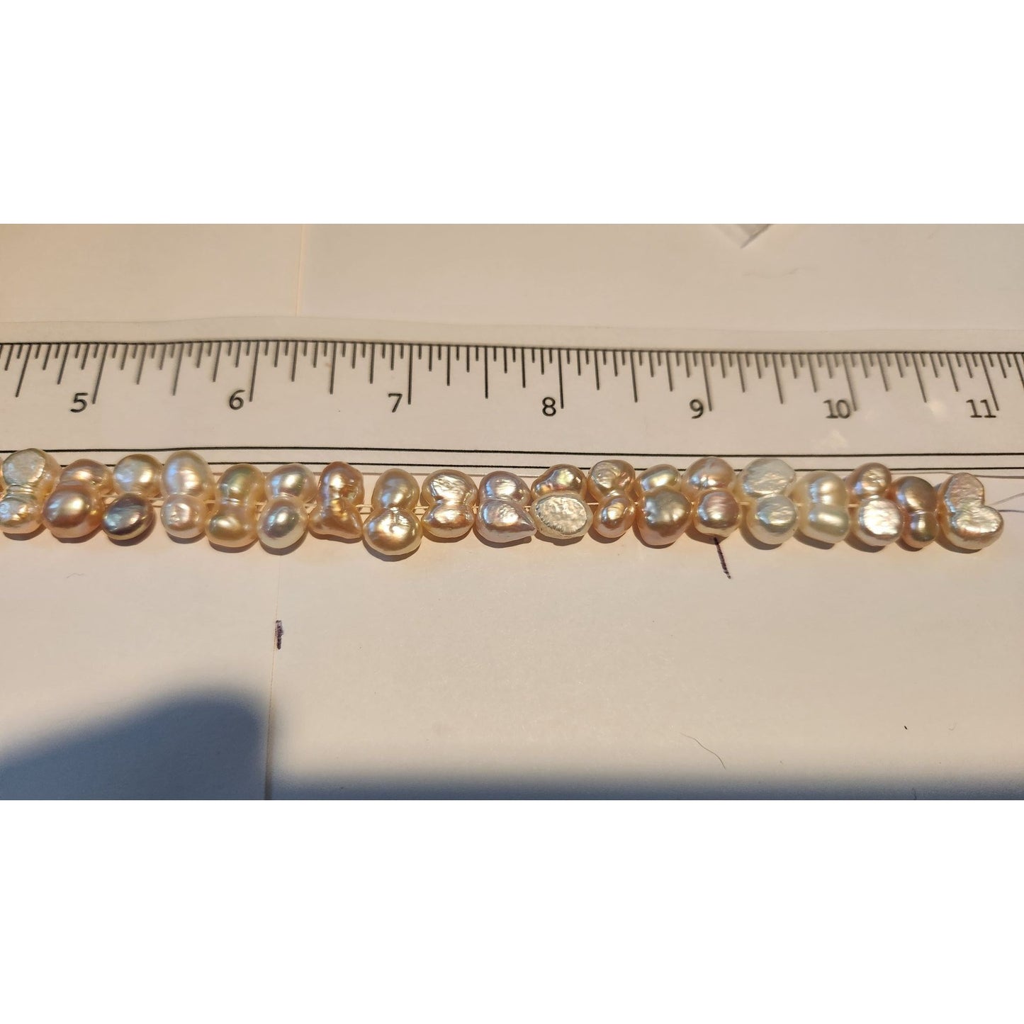 Pearls 32 Freshwater Cultured 10–12mm Baroque Pearl Strand, White 11 " Strand Middle hole Slight Pink tint