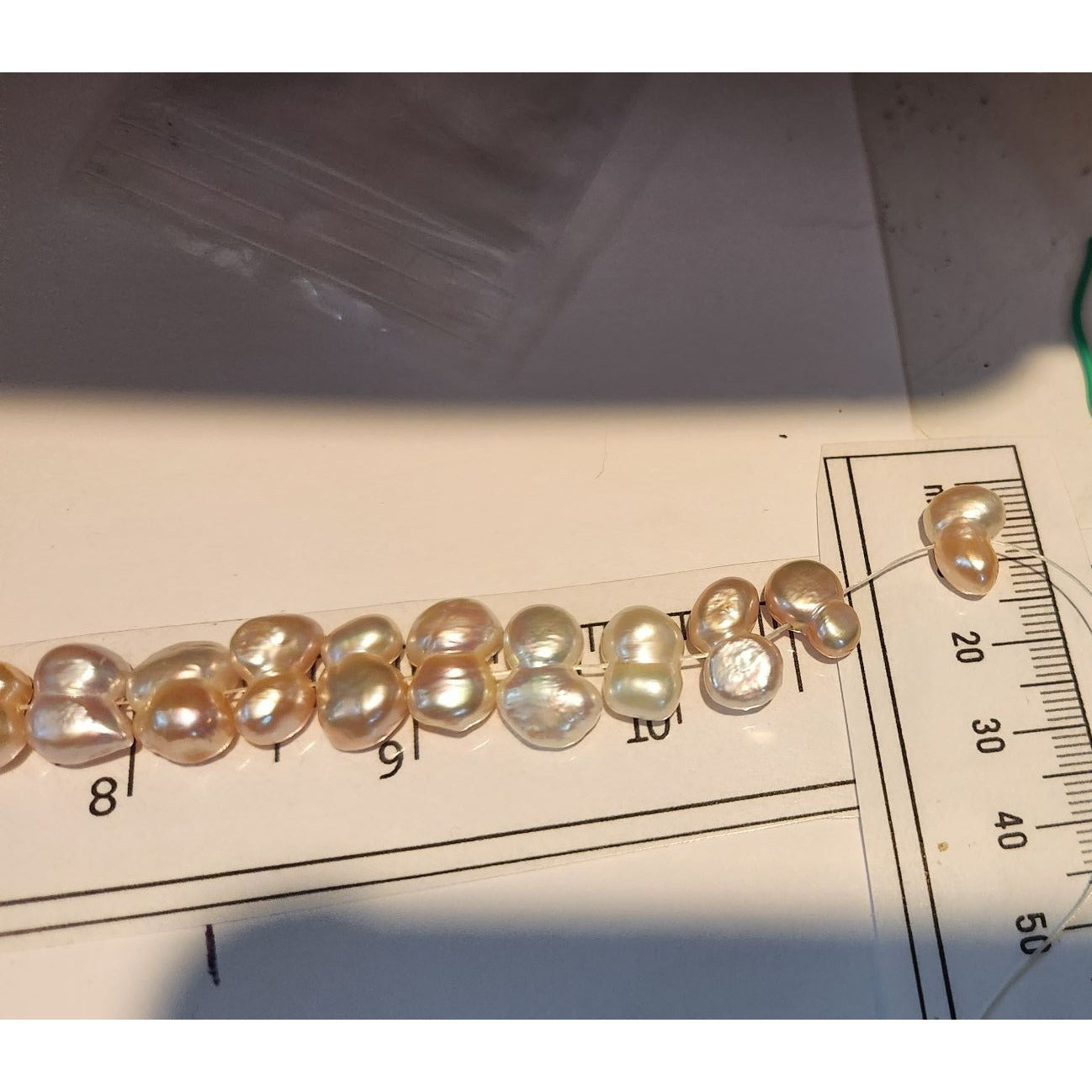Pearls 32 Freshwater Cultured 10–12mm Baroque Pearl Strand, White 11 " Strand Middle hole Slight Pink tint