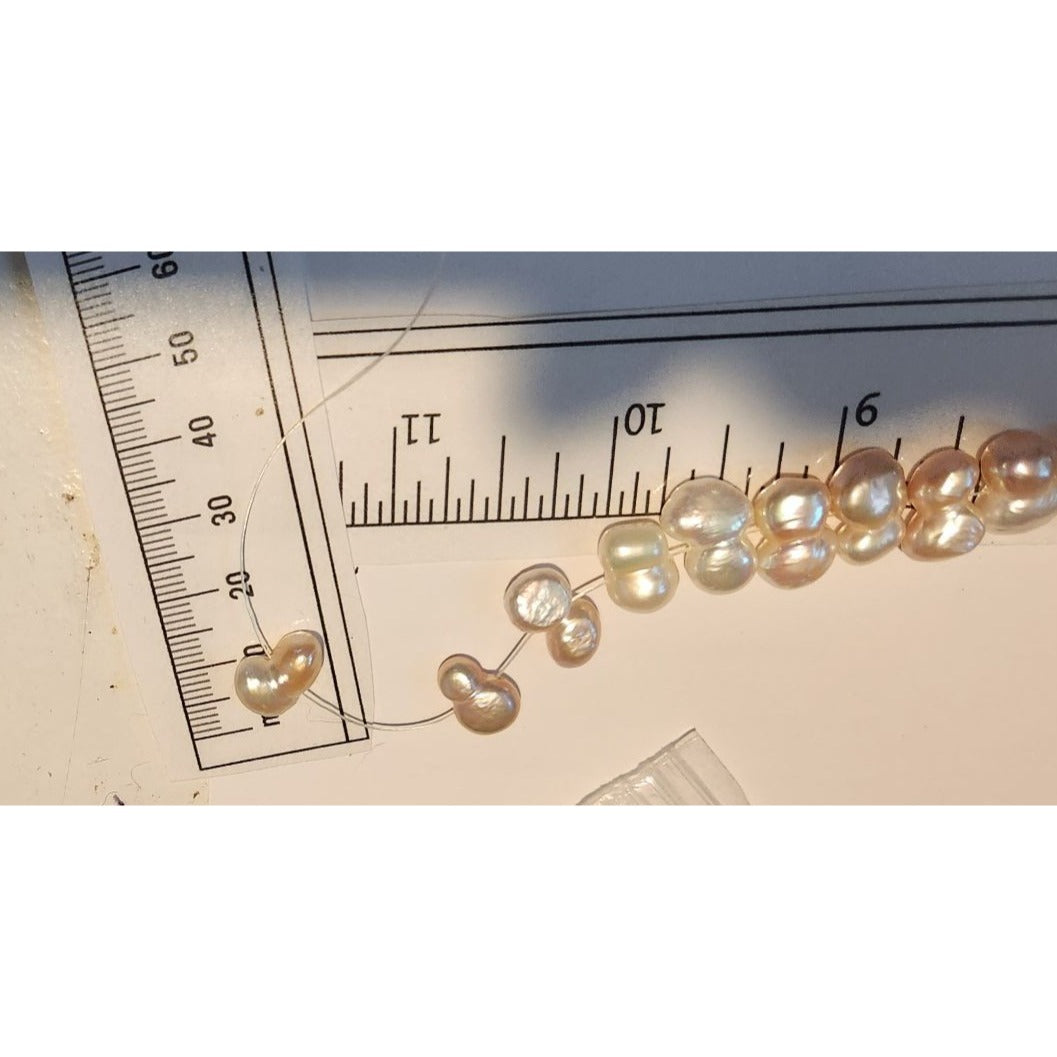 Pearls 32 Freshwater Cultured 10–12mm Baroque Pearl Strand, White 11 " Strand Middle hole Slight Pink tint