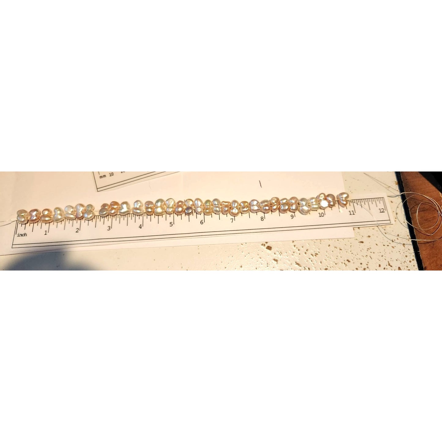 Pearls 32 Freshwater Cultured 10–12mm Baroque Pearl Strand, White 11 " Strand Middle hole Slight Pink tint