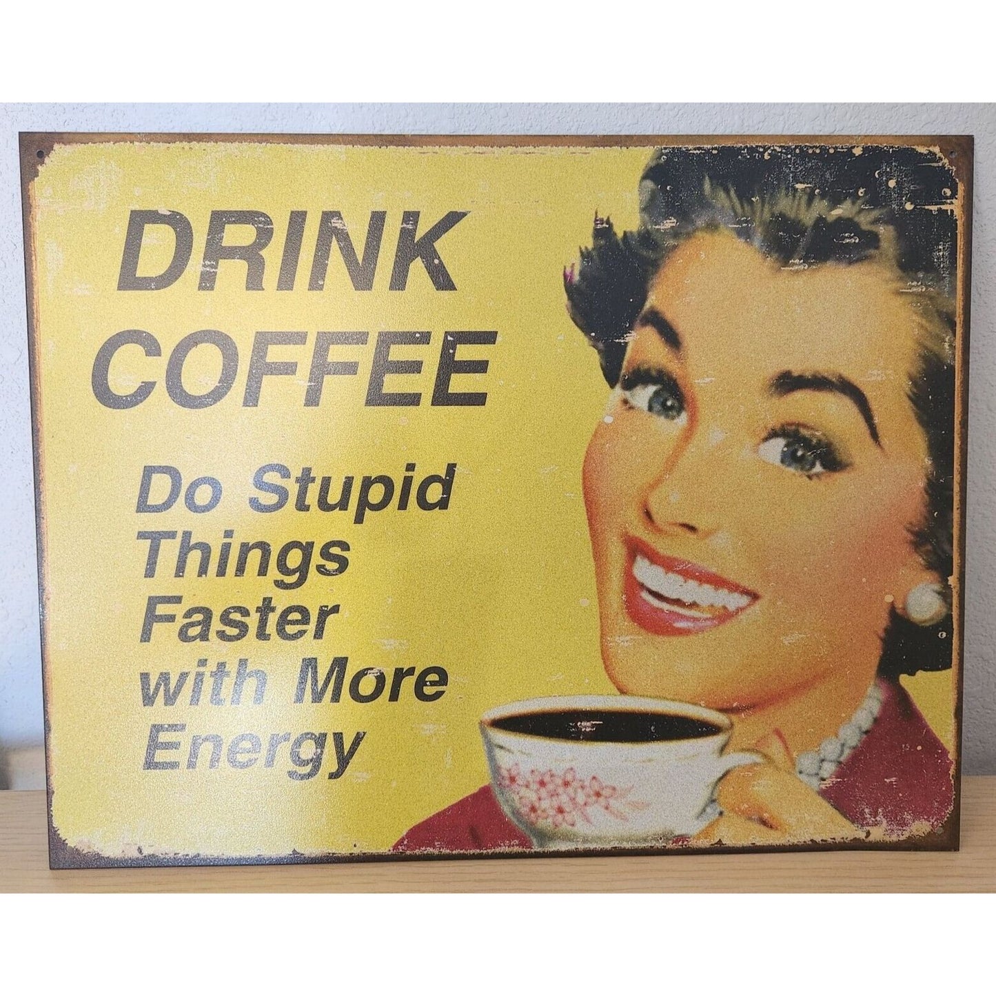 Metal Signs says " Drink Coffee Do Stupid Things Faster with More Energy"