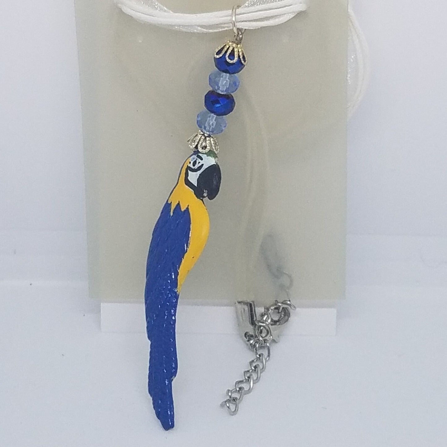 Necklace 2" Painted Blue Parrot Charm Blue Silver Beads White Ribbon Cord