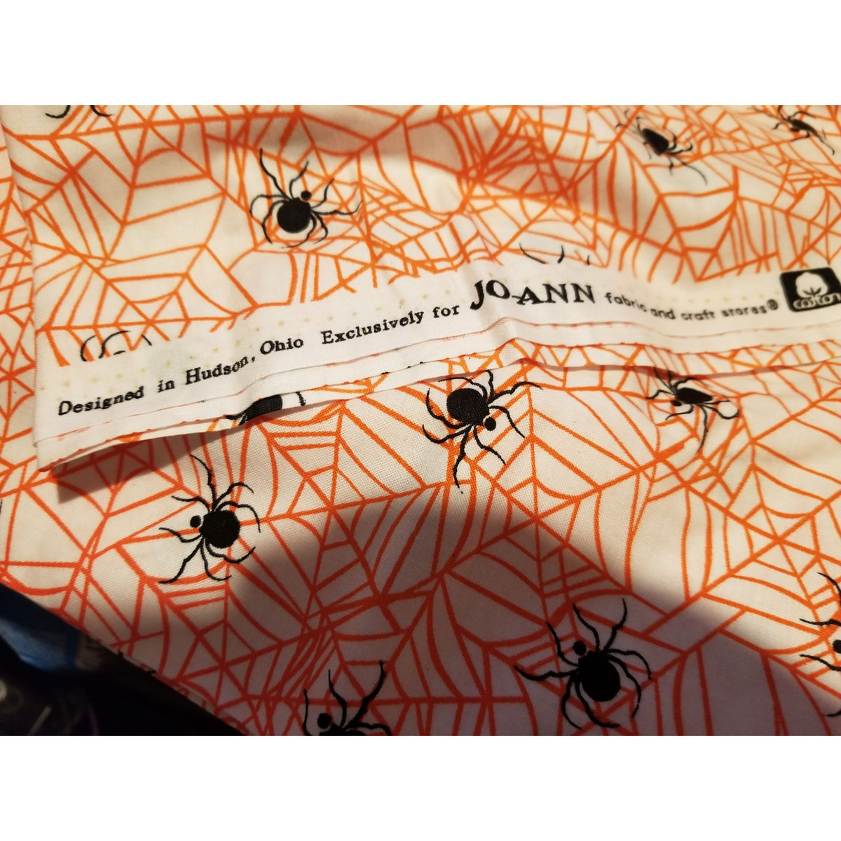 Material Cotton White Fabric Black Spiders  Orange Cobwebs 36" x  44" Cotton JoAnn