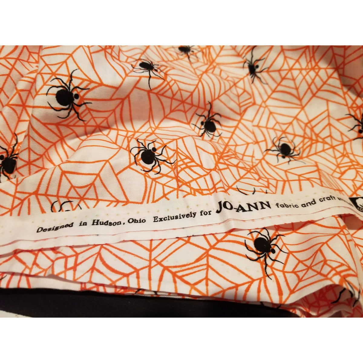 Material Cotton White Fabric Black Spiders  Orange Cobwebs 36" x  44" Cotton JoAnn
