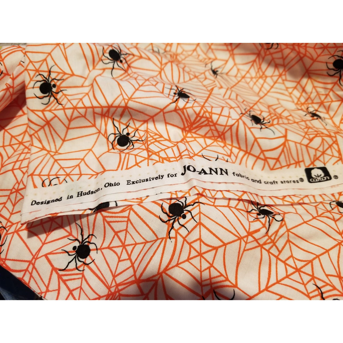 Material Cotton White Fabric Black Spiders  Orange Cobwebs 36" x  44" Cotton JoAnn