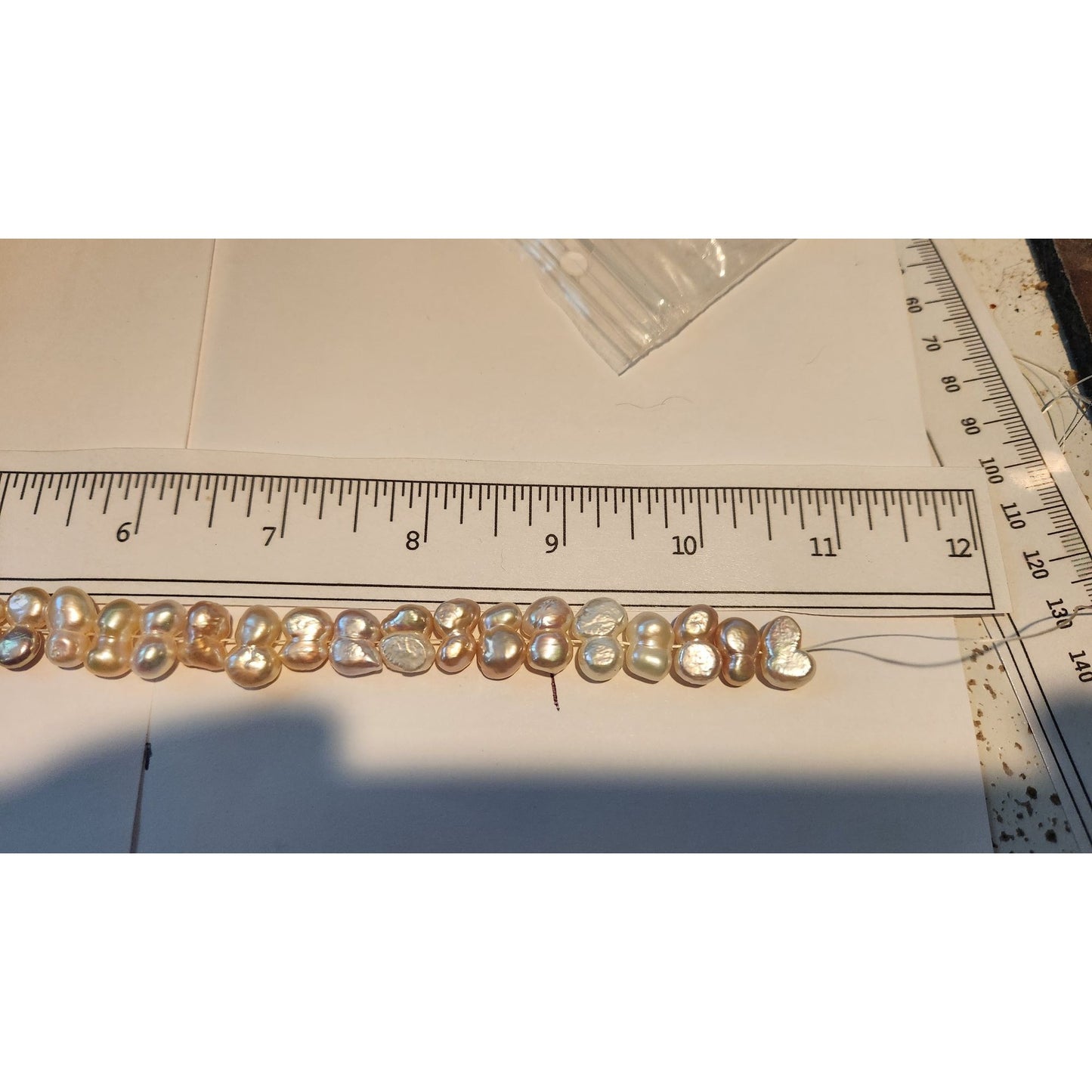 Pearls 32 Freshwater Cultured 10–12mm Baroque Pearl Strand, White 11 " Strand Middle hole Slight Pink tint
