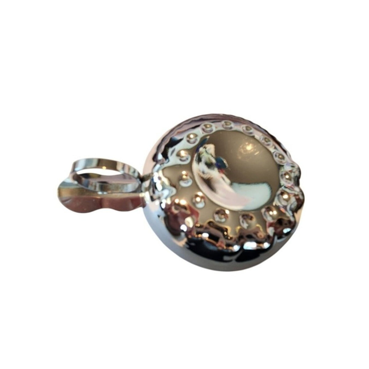 Sommeliers tasting cup A shallow, silver tastevin traditionally for winemakers
