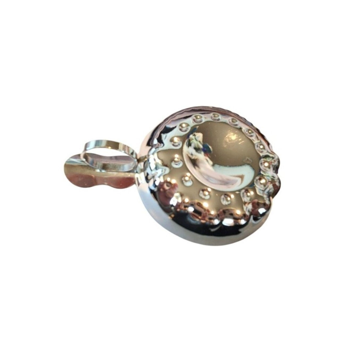Sommeliers tasting cup A shallow, silver tastevin traditionally for winemakers