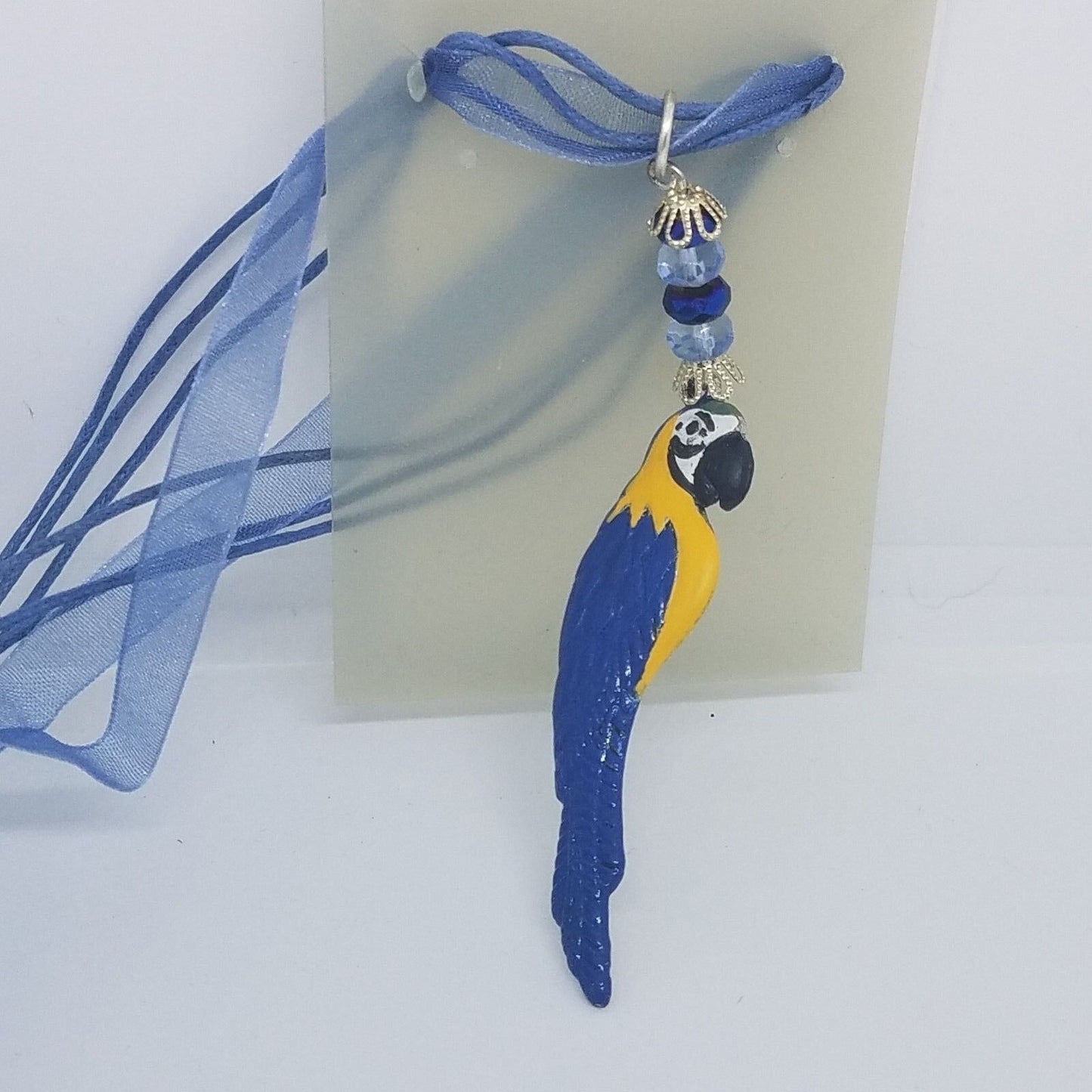 Necklace 2" Painted Blue Parrot Charm Blue Silver Beads Blue Ribbon Cord