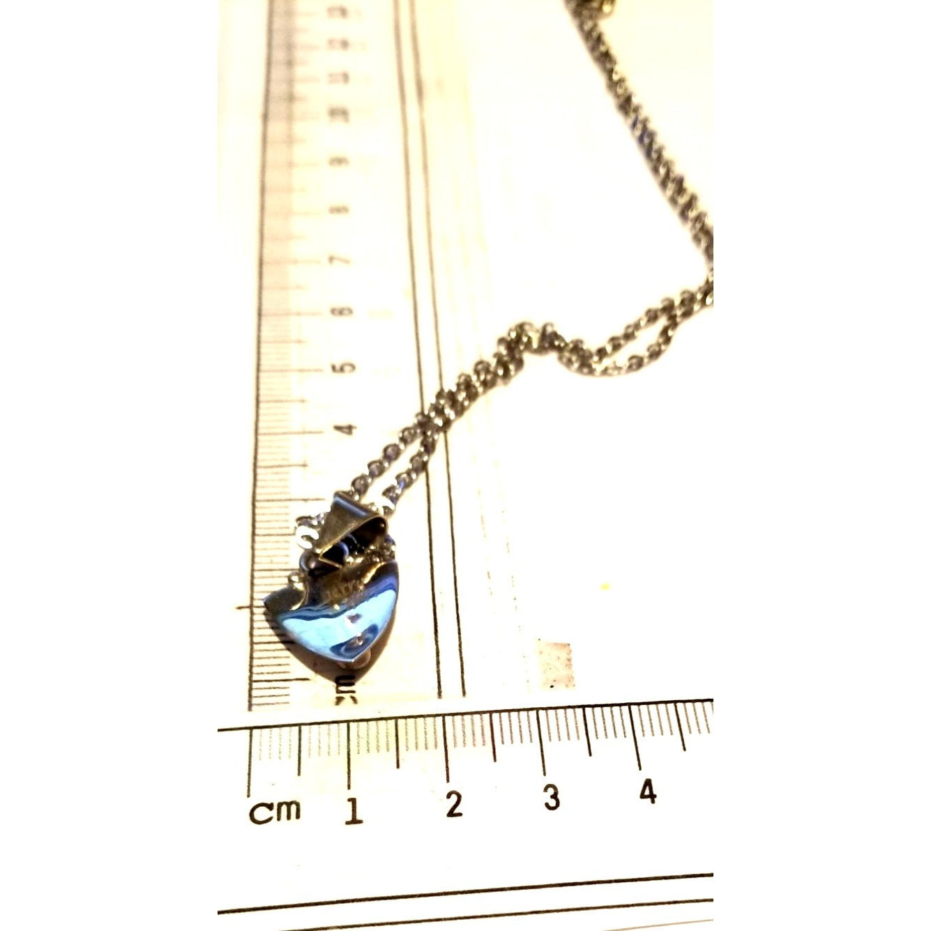 Necklace Silver Topaz Triangle  4. gr 20 ct  1.5 cm  x 2.5 cm  14" chain Blue