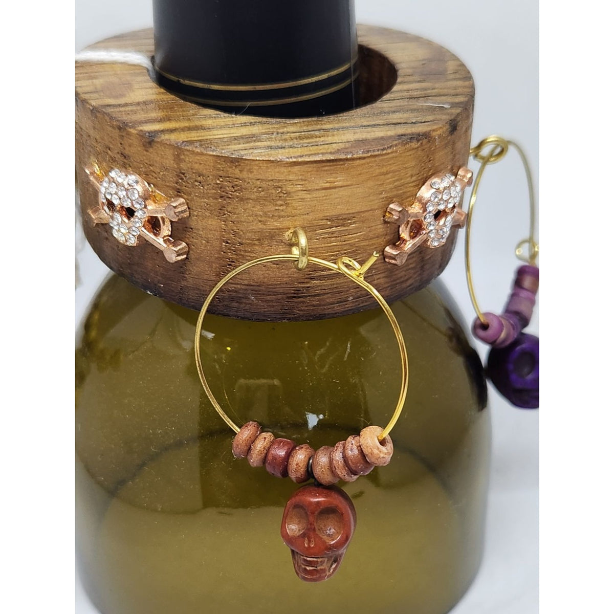Colorful Skull-Themed Wine Glass Charms Set - 4 Unique Charms With Beads & Wood Holder