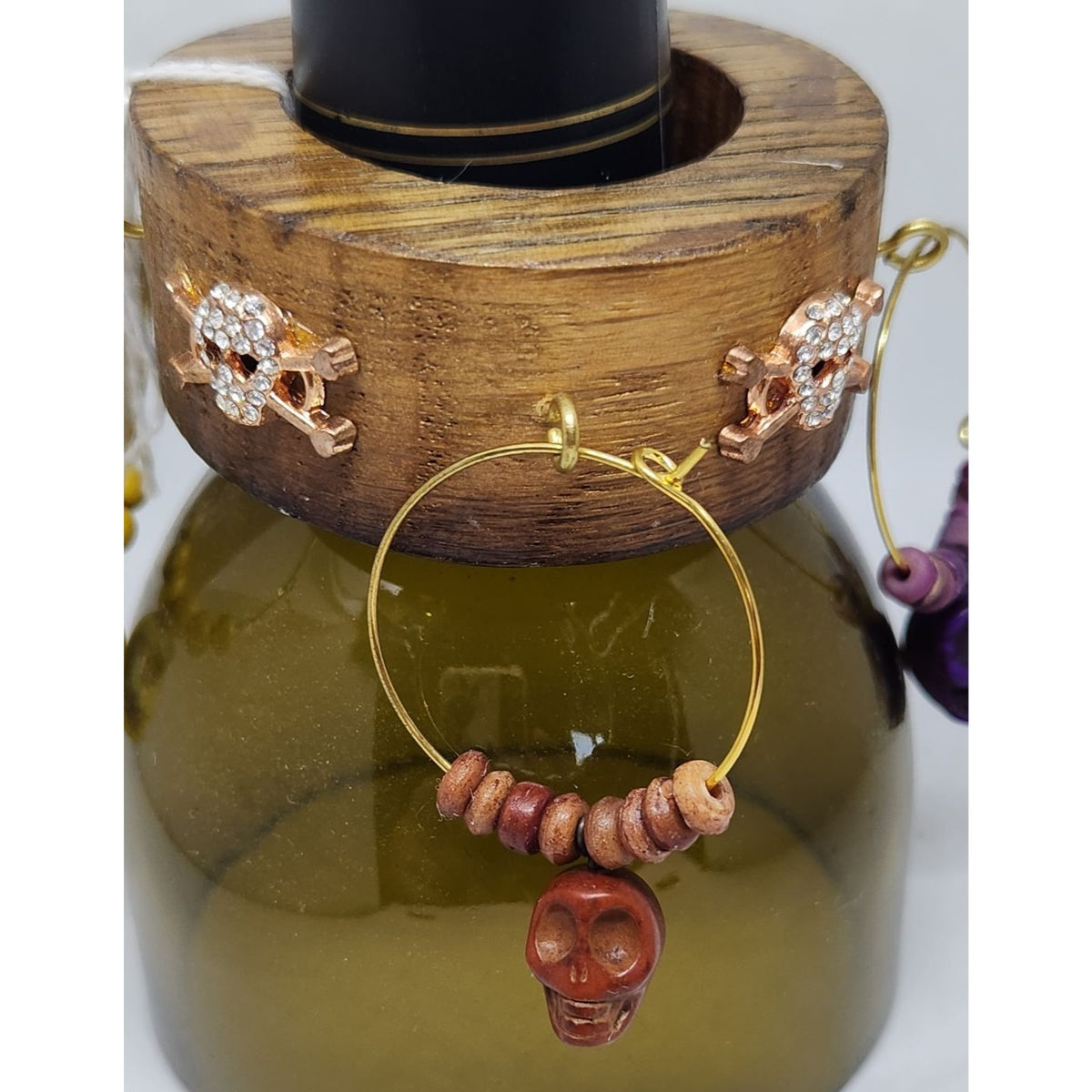 Colorful Skull-Themed Wine Glass Charms Set - 4 Unique Charms With Beads & Wood Holder