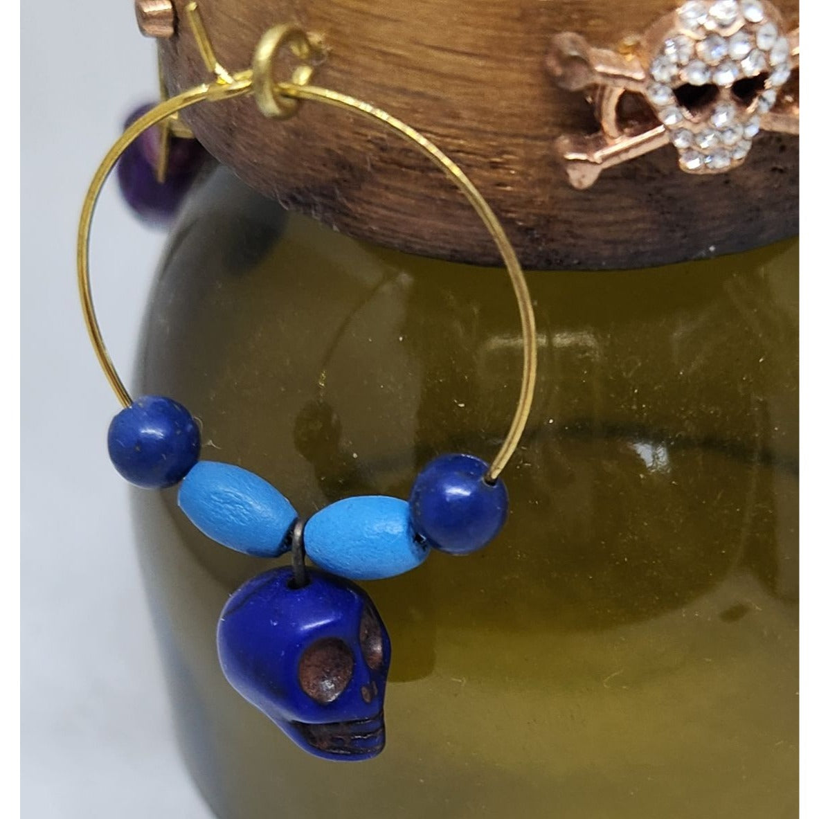 Colorful Skull-Themed Wine Glass Charms Set - 4 Unique Charms With Beads & Wood Holder