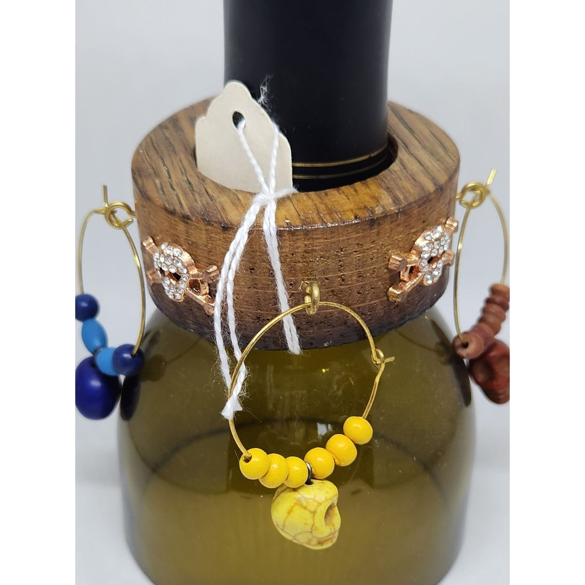 Colorful Skull-Themed Wine Glass Charms Set - 4 Unique Charms With Beads & Wood Holder