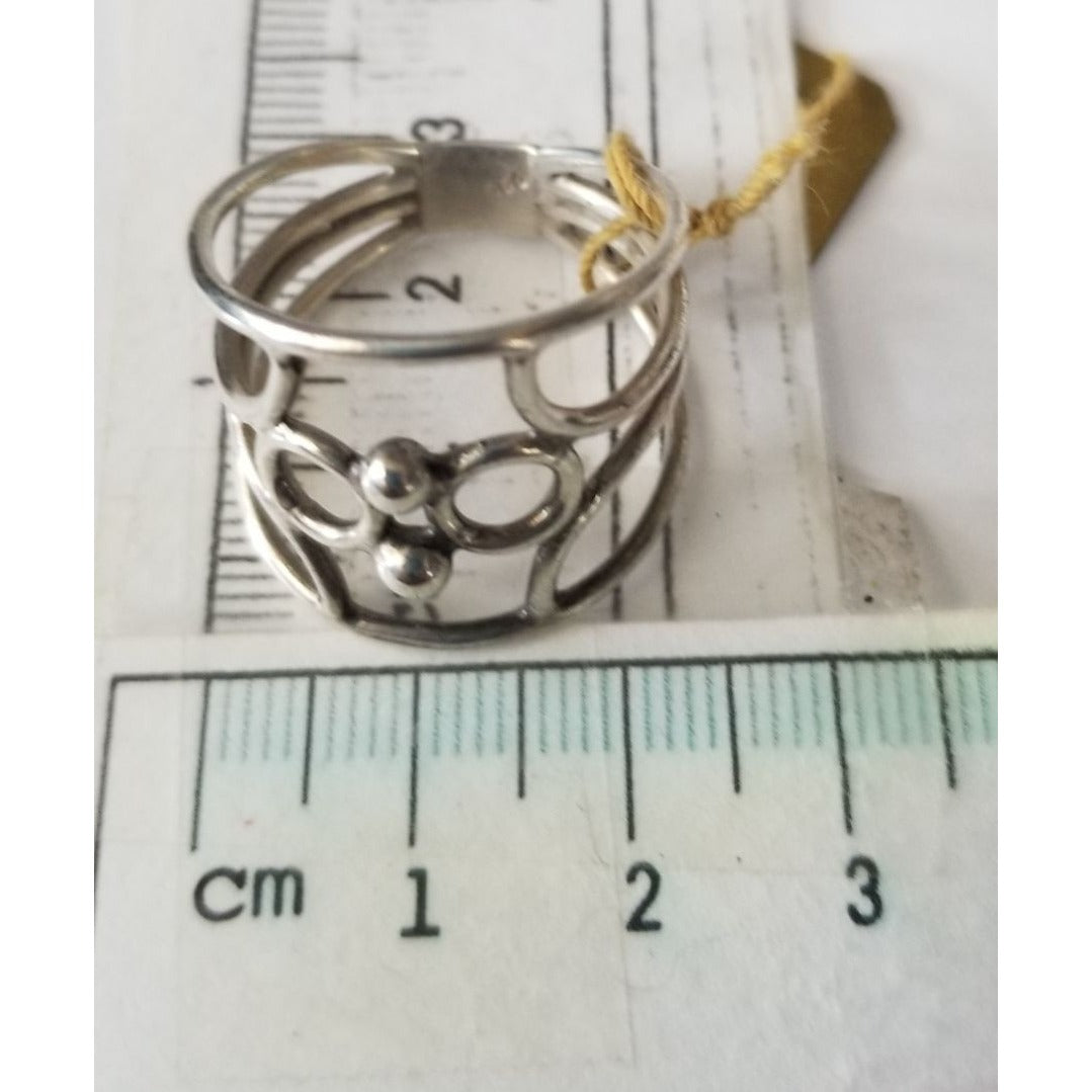Ring Band Open Silver 2 cm wide  Size 9 1/2  5.3 gr 26.5 ct  no Stone 2.5 cm x 2.5 cm  Jerry Fran Harr
