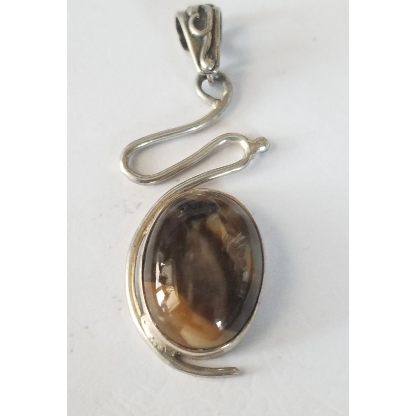 Pendant Tiger Eye  Silver 5.2 gr 26 ct  5 cm  x 2 cm  Stone 7 cm x 2 cm Bail 3 x 2 cm Jerry Fran Harr