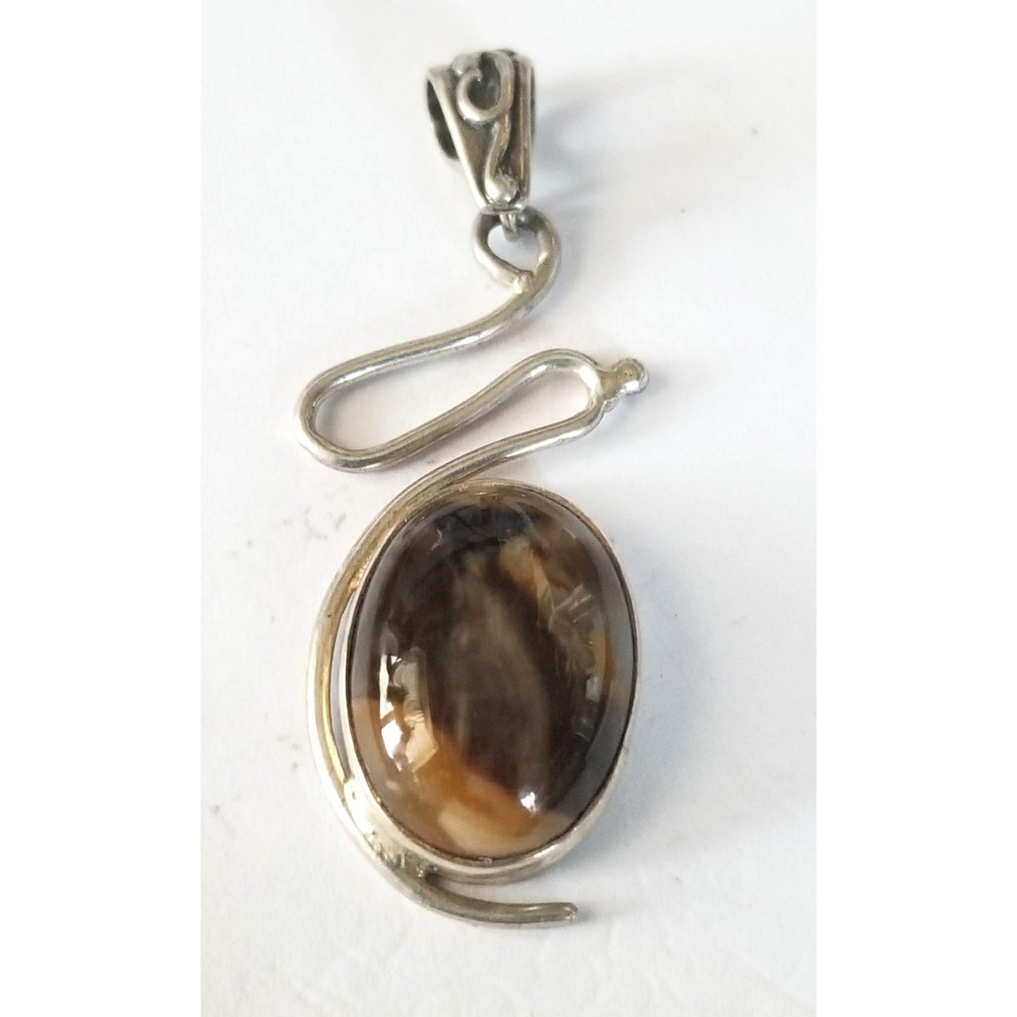 Pendant Tiger Eye  Silver 5.2 gr 26 ct  5 cm  x 2 cm  Stone 7 cm x 2 cm Bail 3 x 2 cm Jerry Fran Harr