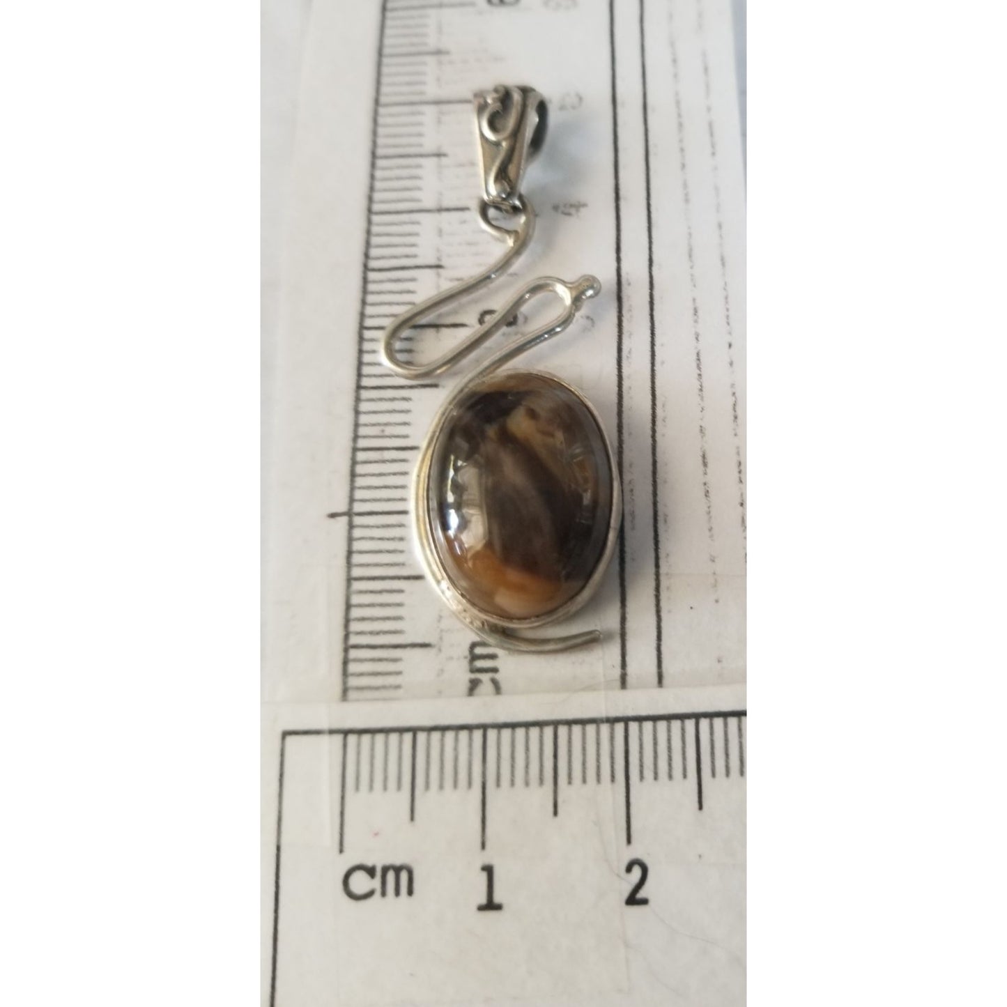 Pendant Tiger Eye  Silver 5.2 gr 26 ct  5 cm  x 2 cm  Stone 7 cm x 2 cm Bail 3 x 2 cm Jerry Fran Harr