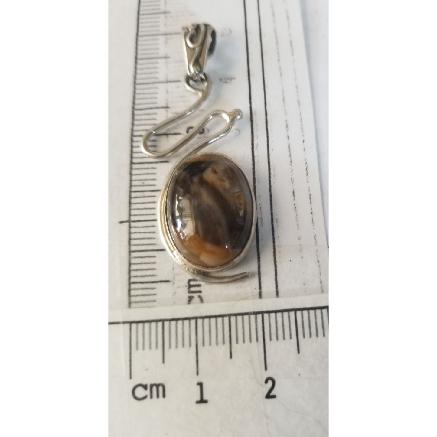 Pendant Tiger Eye  Silver 5.2 gr 26 ct  5 cm  x 2 cm  Stone 7 cm x 2 cm Bail 3 x 2 cm Jerry Fran Harr