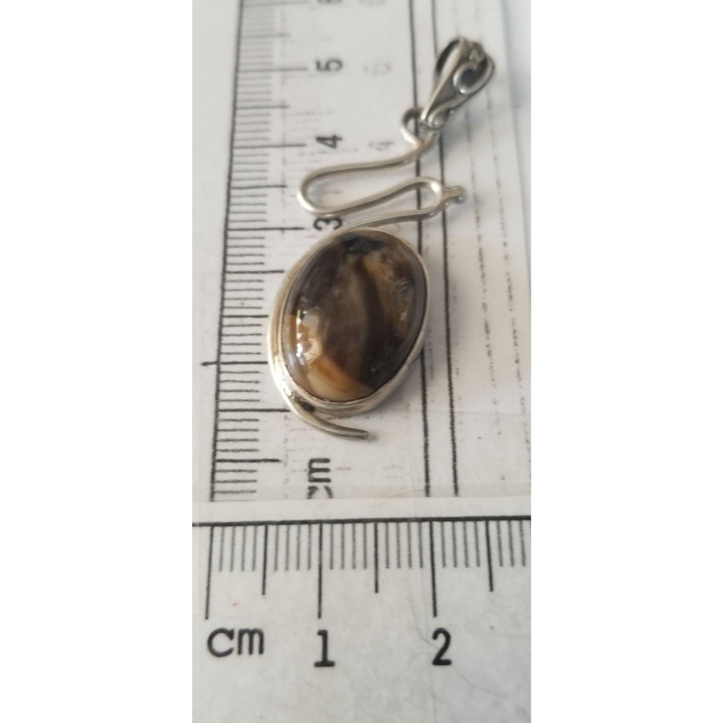 Pendant Tiger Eye  Silver 5.2 gr 26 ct  5 cm  x 2 cm  Stone 7 cm x 2 cm Bail 3 x 2 cm Jerry Fran Harr