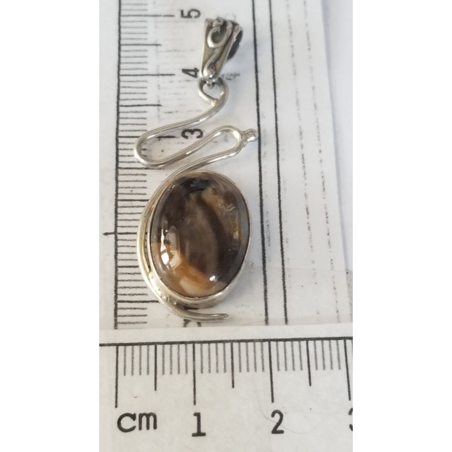 Pendant Tiger Eye  Silver 5.2 gr 26 ct  5 cm  x 2 cm  Stone 7 cm x 2 cm Bail 3 x 2 cm Jerry Fran Harr