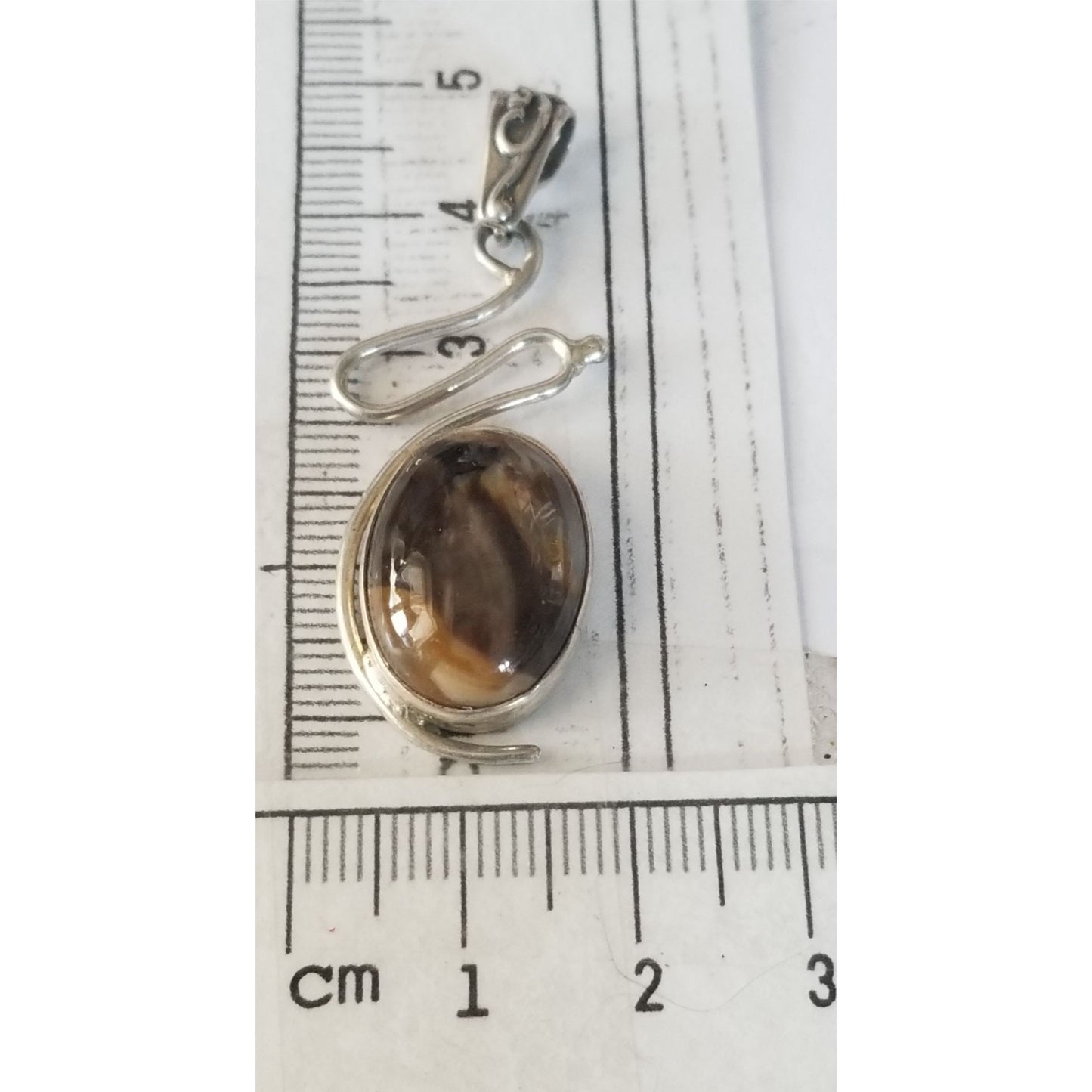 Pendant Tiger Eye  Silver 5.2 gr 26 ct  5 cm  x 2 cm  Stone 7 cm x 2 cm Bail 3 x 2 cm Jerry Fran Harr
