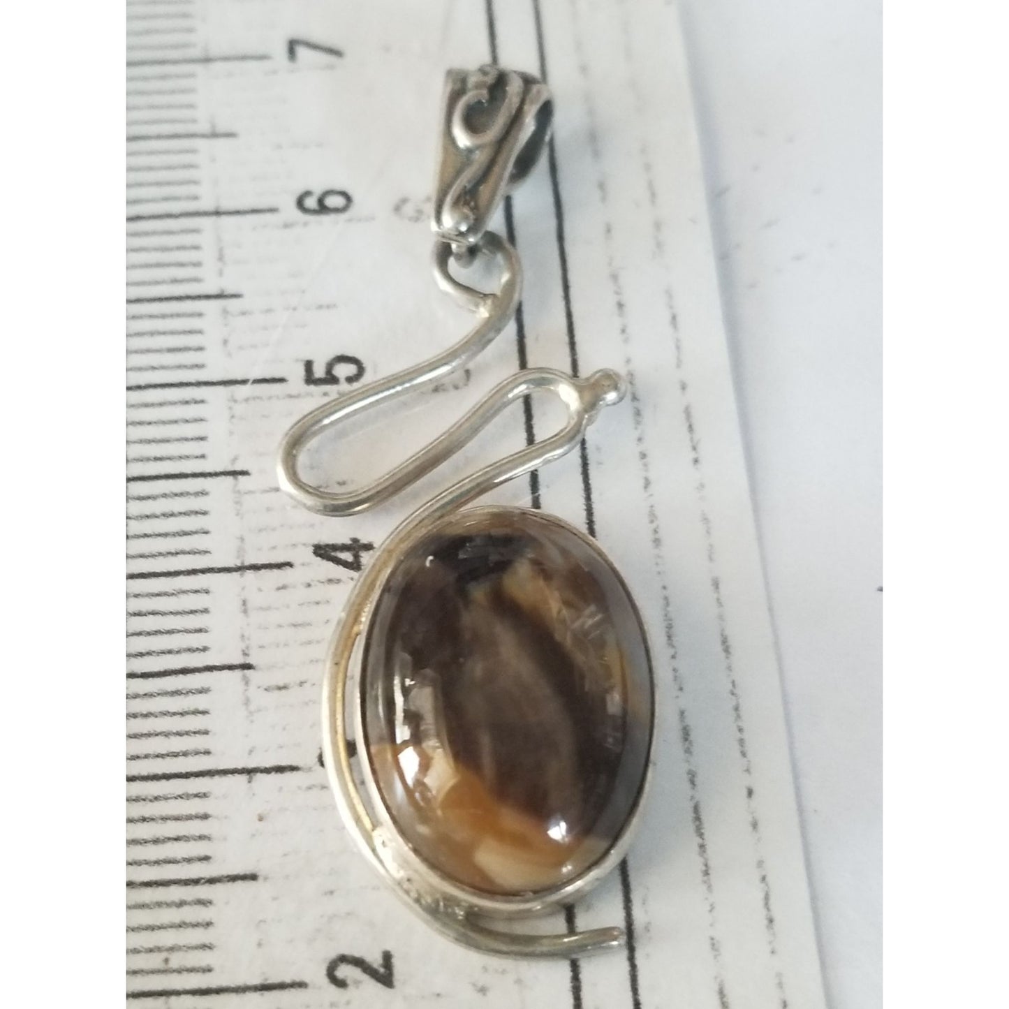 Pendant Tiger Eye  Silver 5.2 gr 26 ct  5 cm  x 2 cm  Stone 7 cm x 2 cm Bail 3 x 2 cm Jerry Fran Harr
