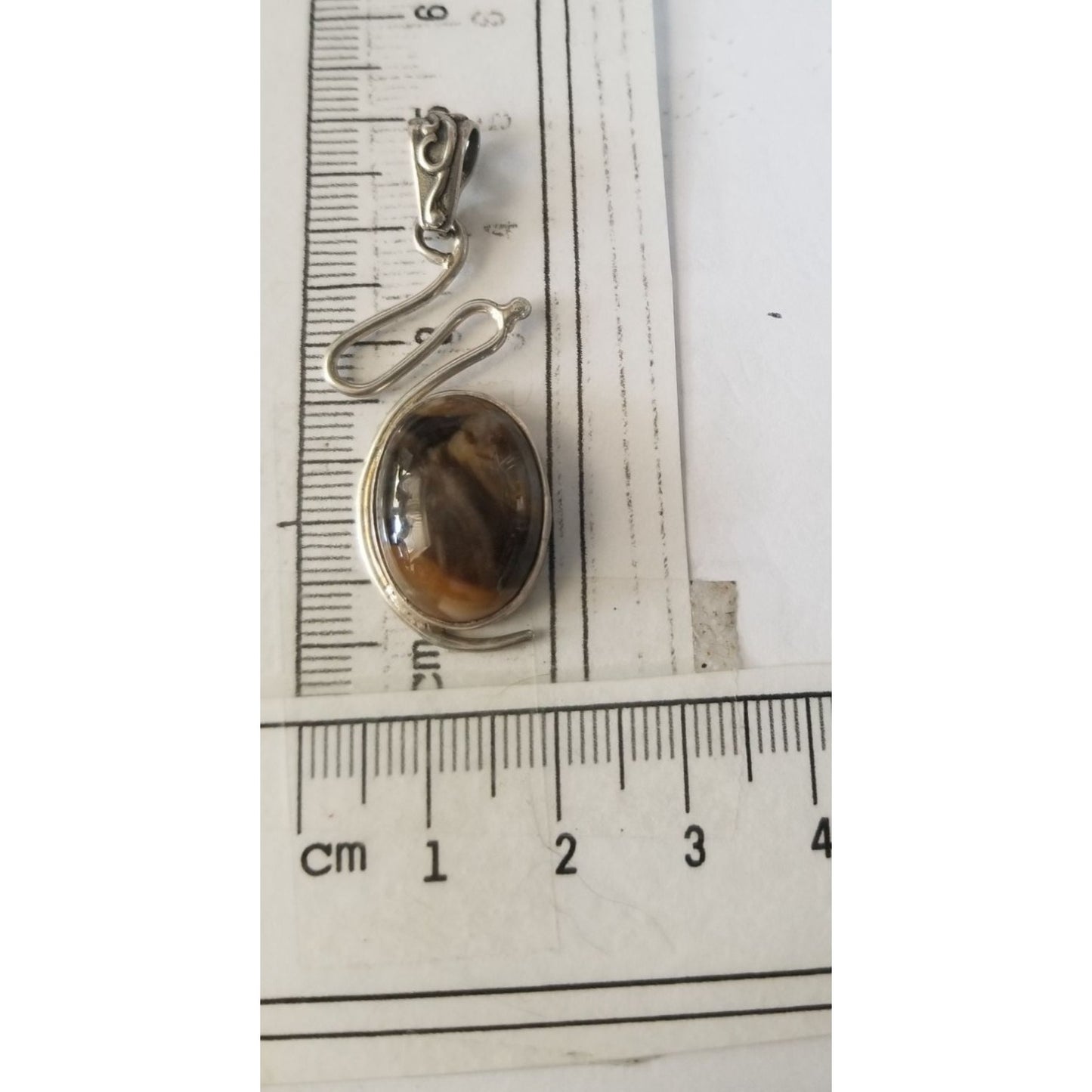 Pendant Tiger Eye  Silver 5.2 gr 26 ct  5 cm  x 2 cm  Stone 7 cm x 2 cm Bail 3 x 2 cm Jerry Fran Harr