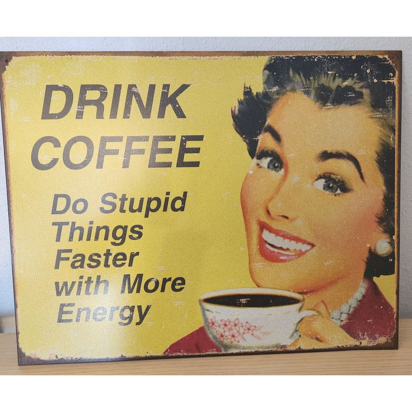 Metal Signs says " Drink Coffee Do Stupid Things Faster with More Energy"