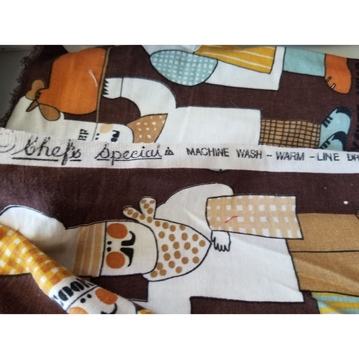 Material  Brown Bakers Chef Cake  44" x 19"    Cotton Craft Clothing Joann