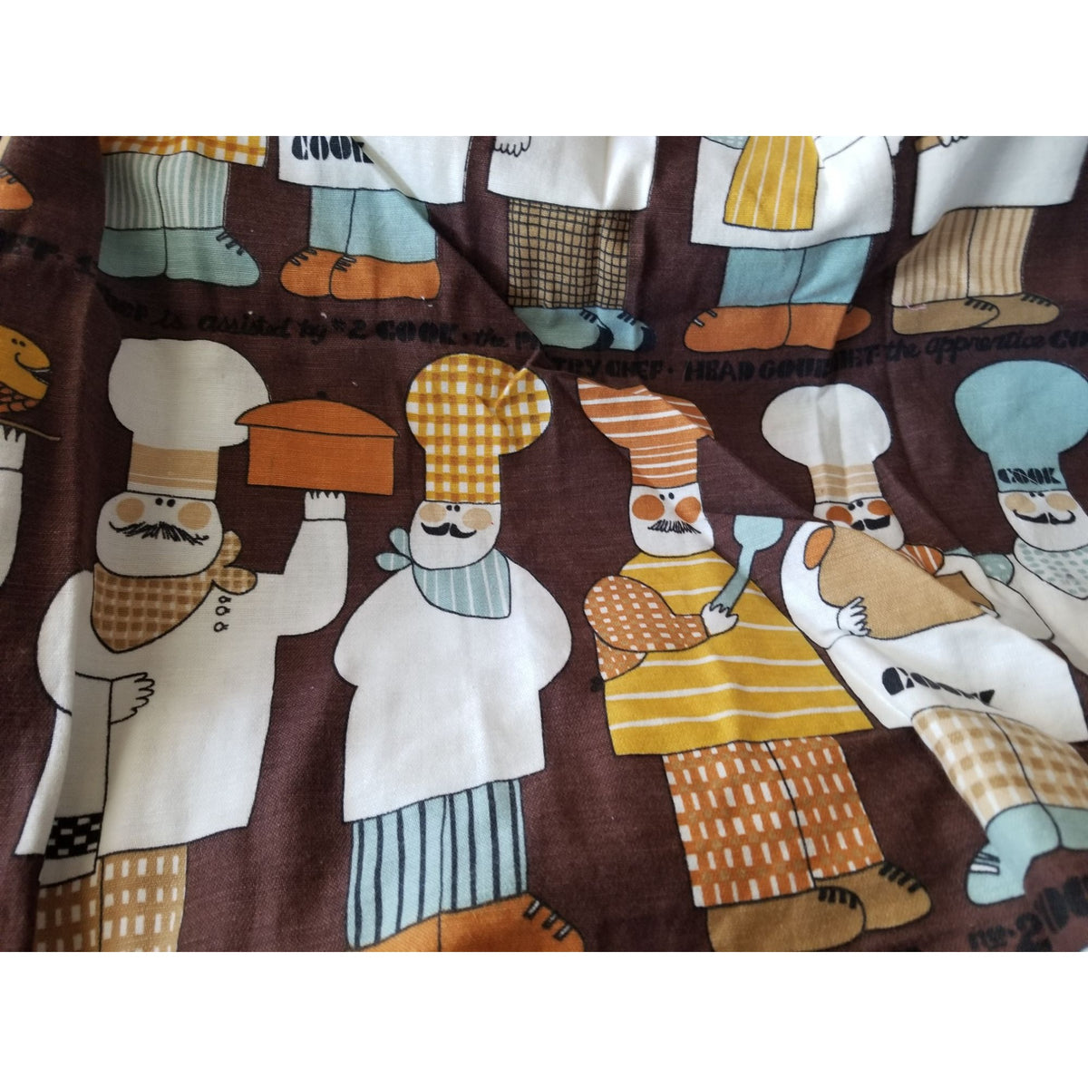 Material  Brown Bakers Chef Cake  44" x 19"    Cotton Craft Clothing Joann