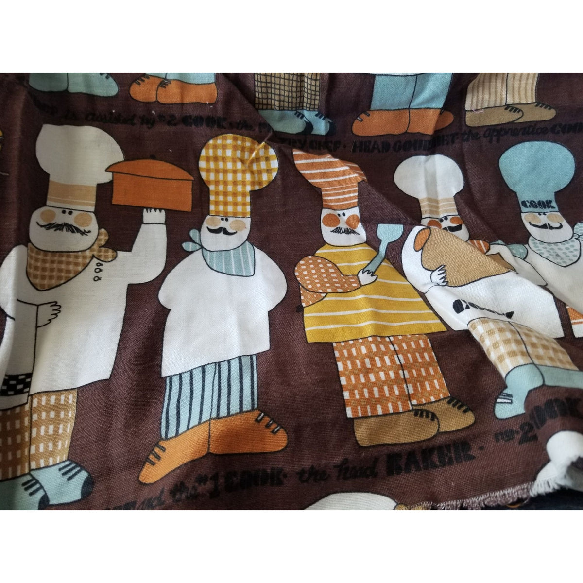 Material  Brown Bakers Chef Cake  44" x 19"    Cotton Craft Clothing Joann