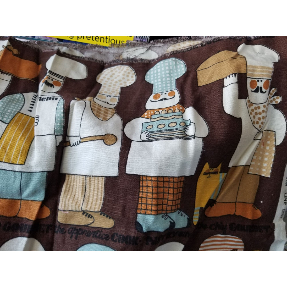 Material  Brown Bakers Chef Cake  44" x 19"    Cotton Craft Clothing Joann
