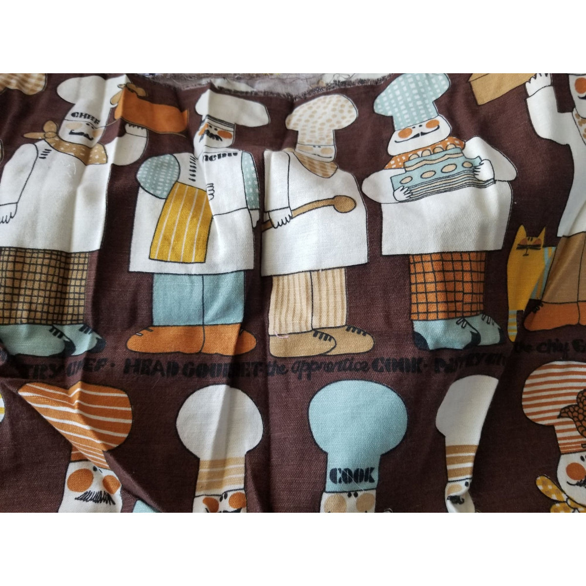 Material  Brown Bakers Chef Cake  44" x 19"    Cotton Craft Clothing Joann