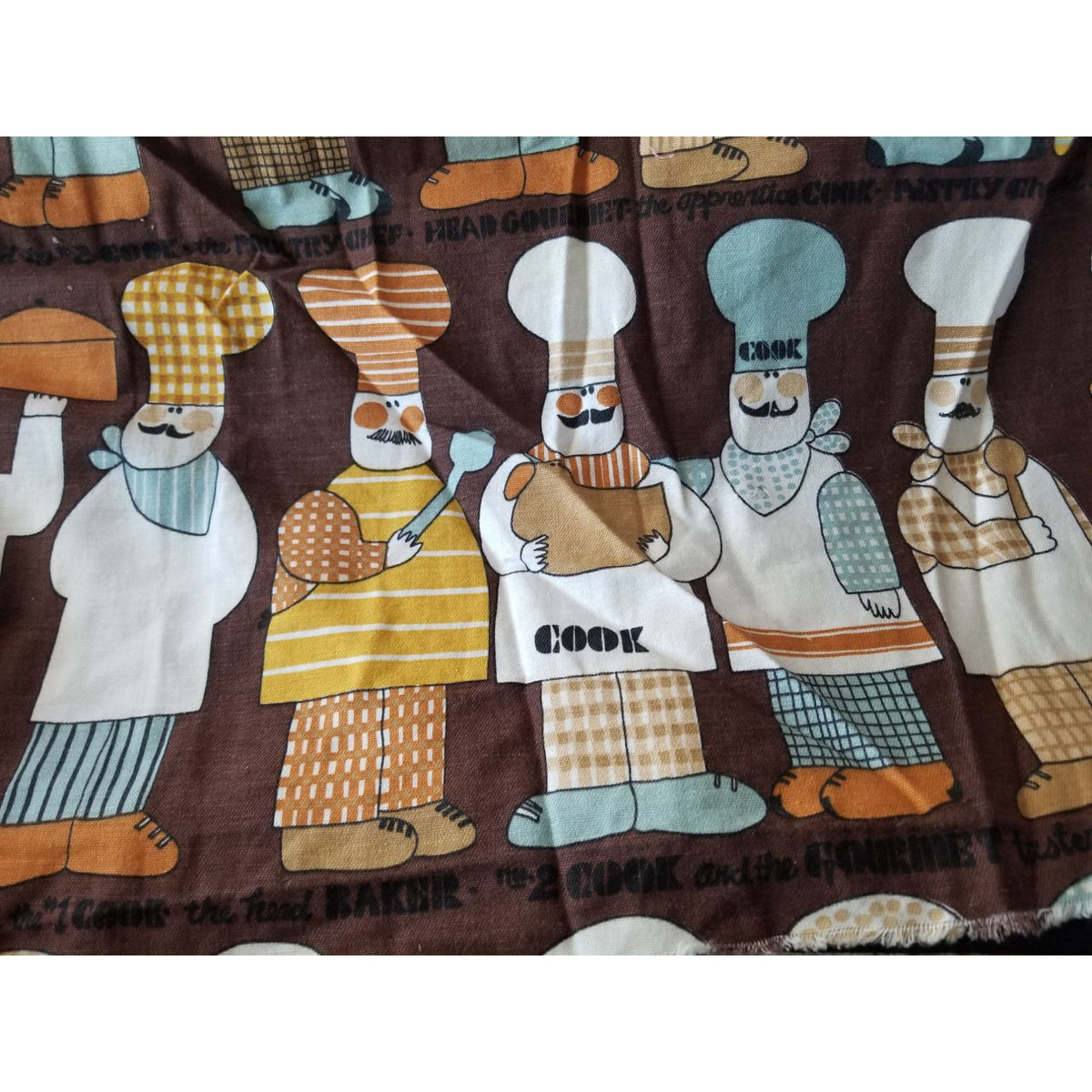 Material  Brown Bakers Chef Cake  44" x 19"    Cotton Craft Clothing Joann