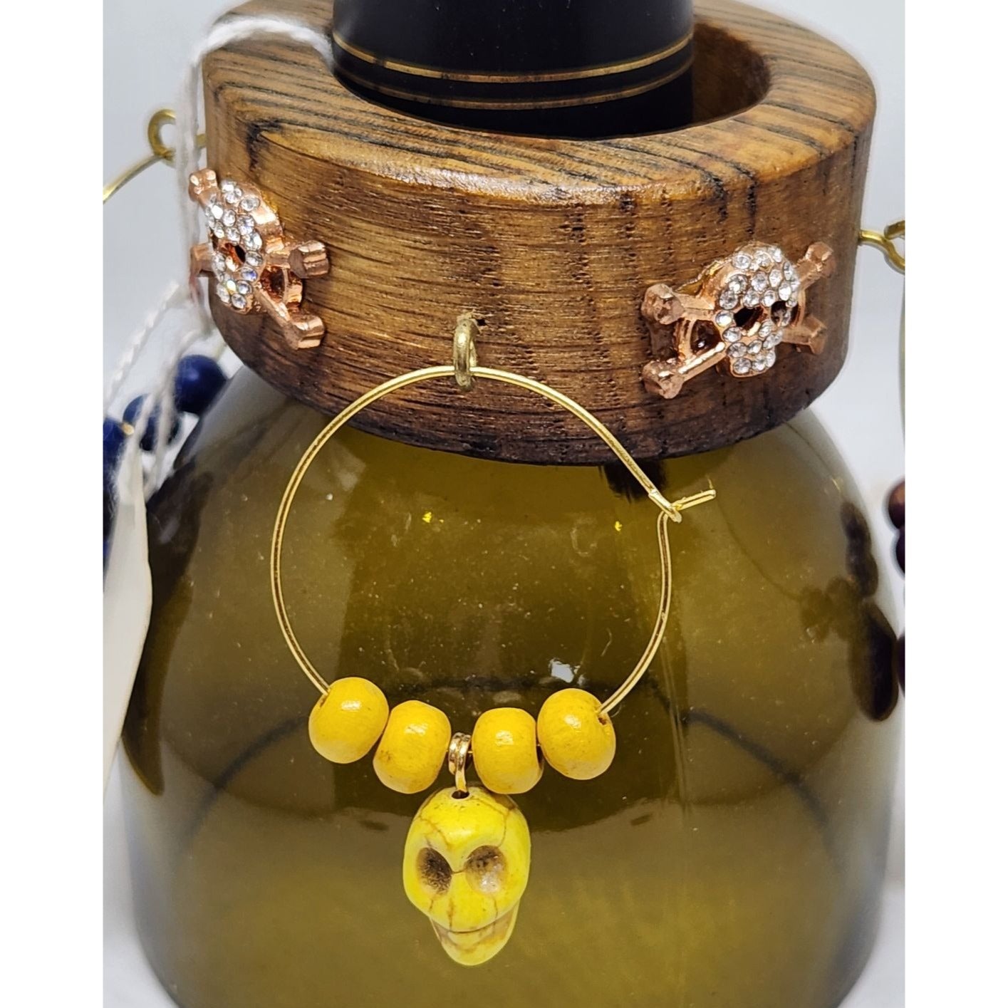 Colorful Skull-Themed Wine Glass Charms Set - 4 Unique Charms With Beads & Wood Holder
