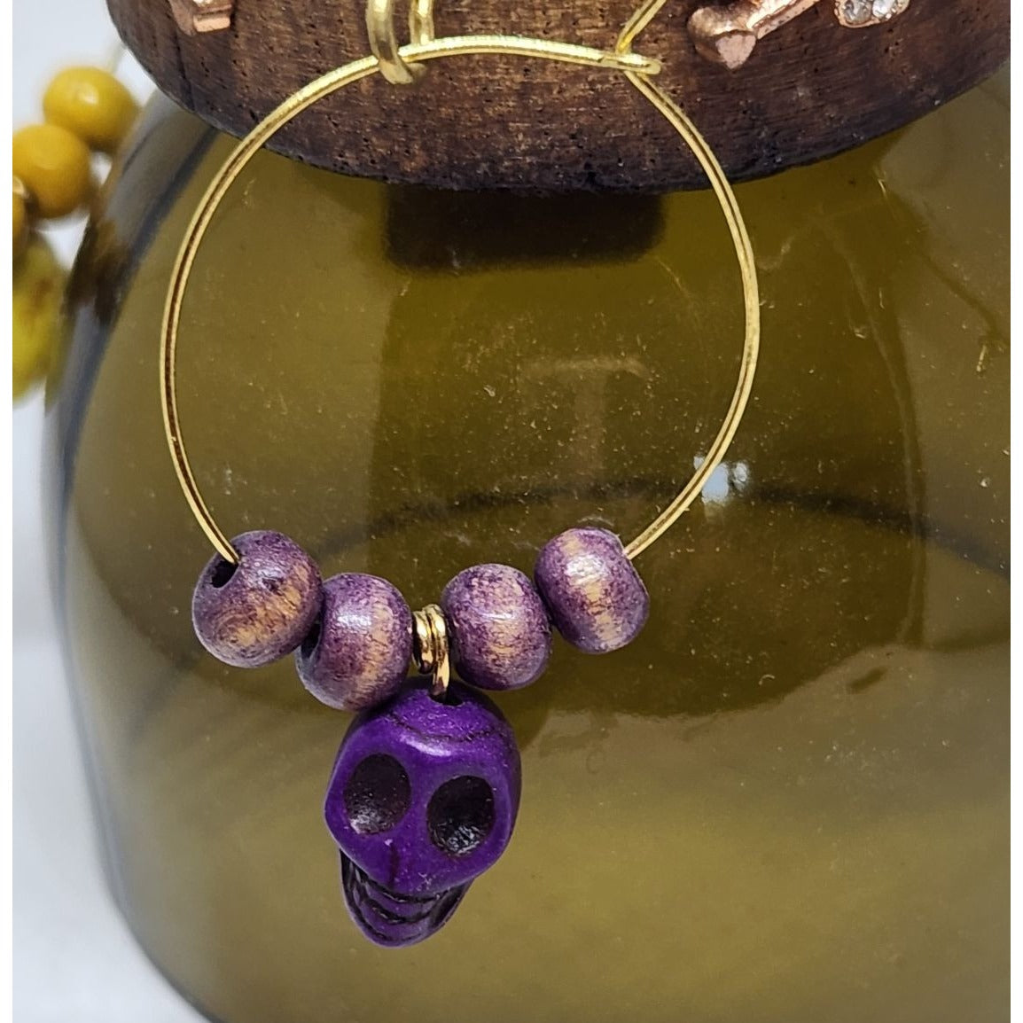 Colorful Skull-Themed Wine Glass Charms Set - 4 Unique Charms With Beads & Wood Holder