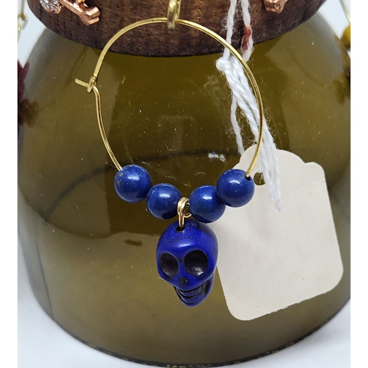 Colorful Skull-Themed Wine Glass Charms Set - 4 Unique Charms With Beads & Wood Holder