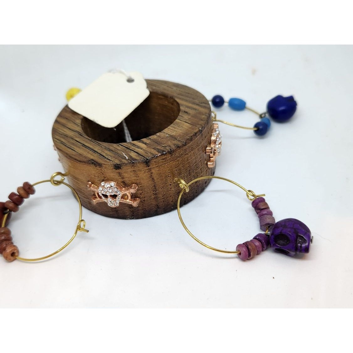 Colorful Skull-Themed Wine Glass Charms Set - 4 Unique Charms With Beads & Wood Holder