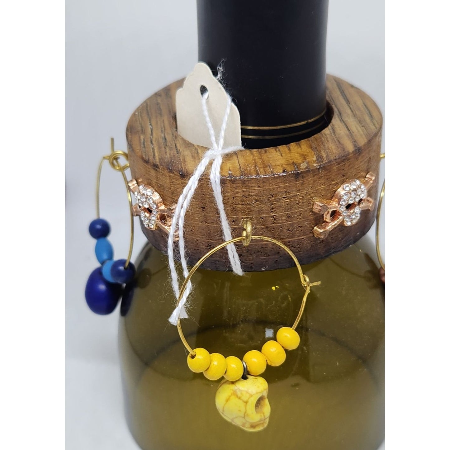 Colorful Skull-Themed Wine Glass Charms Set - 4 Unique Charms With Beads & Wood Holder